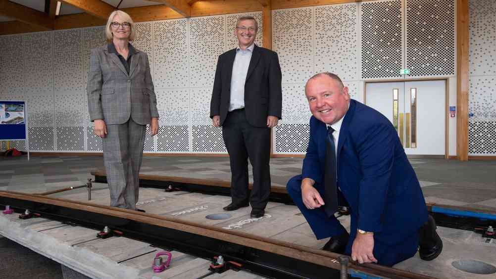 L-R: Margot James, executive chair, WMG, Stuart Croft, vice chancellor, University of Warwick and councilor Jim O’Boyle, cabinet member for Jobs, Regeneration and Climate Change, Coventry City Council, stand on the new Coventry VLR track form